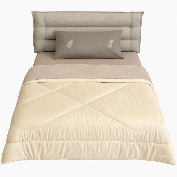 Tember Wood Beige bed and pillow with leaf design.

